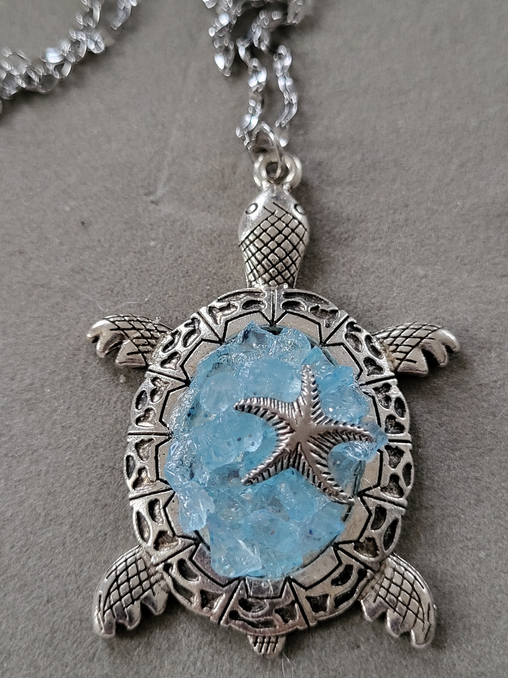Silver Toned Turtle Necklace with Light Blue Glass and Starfish Accent